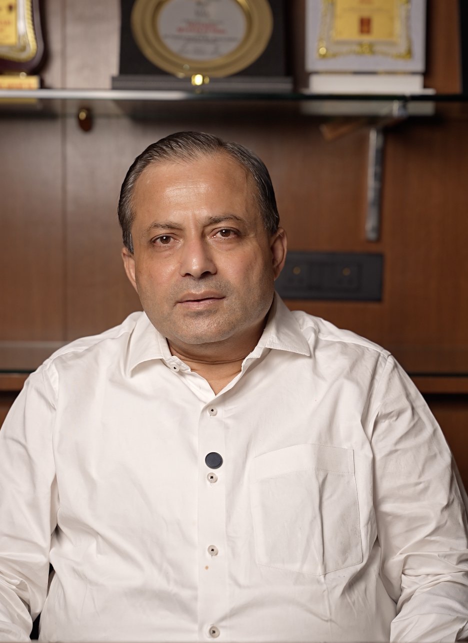 Karan Kothari Group director in a white shirt